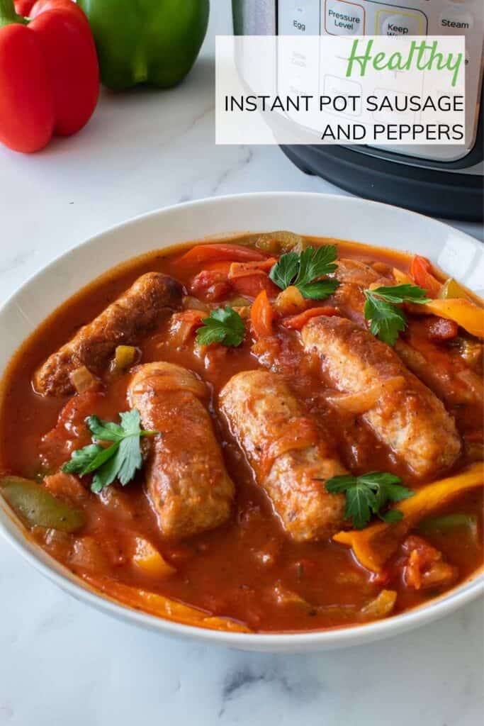 A bowl with sausage and peppers, with an Instant Pot in the background.