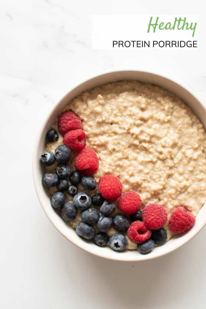 A bowl of protein oatmeal with berries.