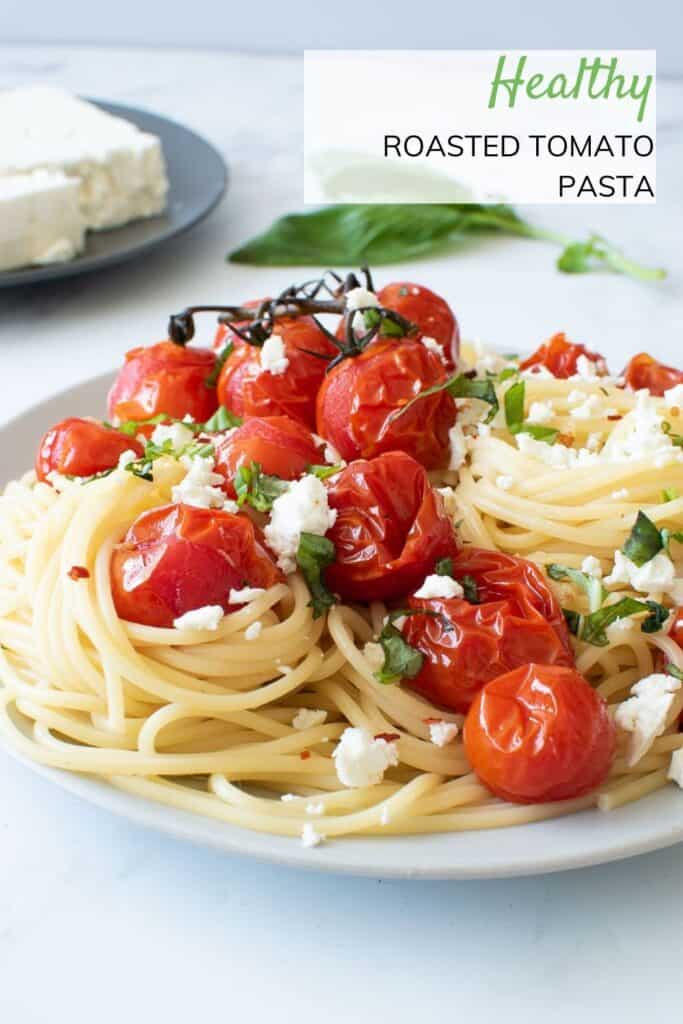 Close up of roasted tomato pasta on a plate.