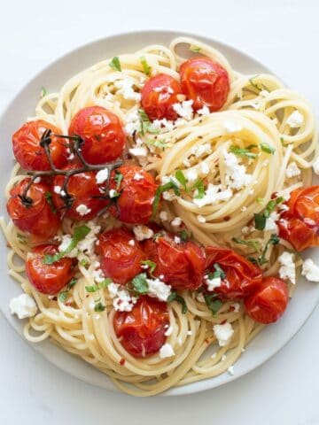 Spaghetti with roasted cherry tomatoes, feta and basil.