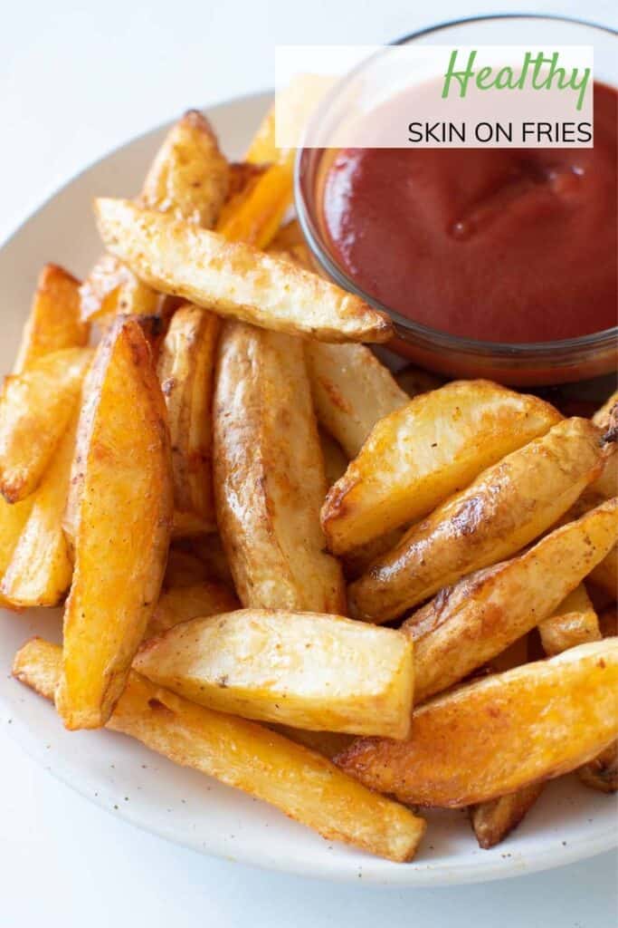 Skin on fries with ketchup.