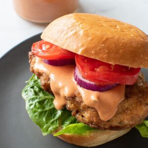 Spicy burger sauce on a chicken burger.