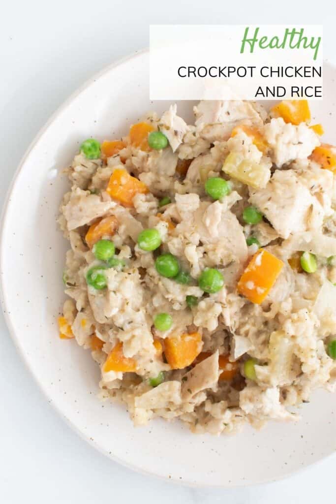 Chicken, rice and vegetables on a plate.