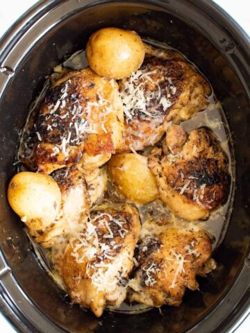 Slow cooker garlic Parmesan chicken and potatoes.