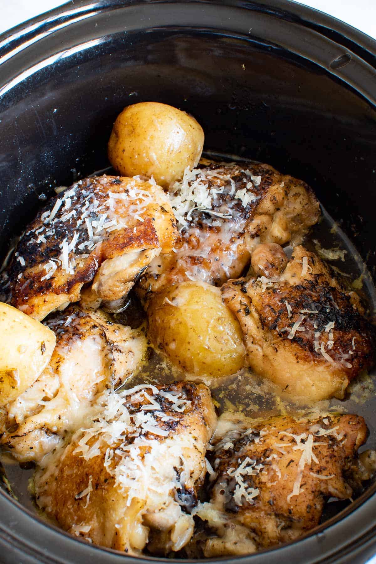 Crockpot garlic Parmesan chicken and potatoes.