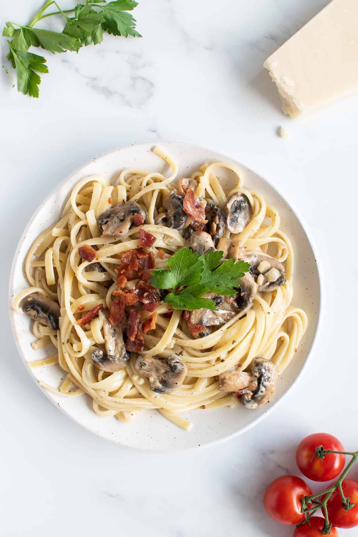 Bacon and mushroom linguine with parmesan on the side.