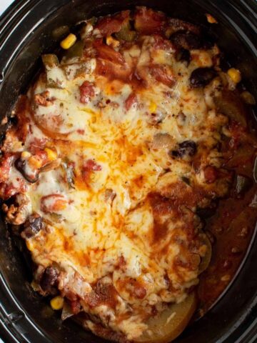 Slow cooker crockpot casserole with ground beef, potatoes and beans.