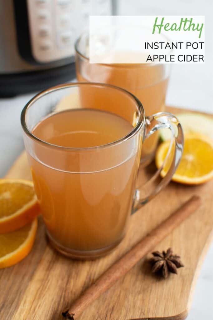 Close up of glass of hot apple cider.