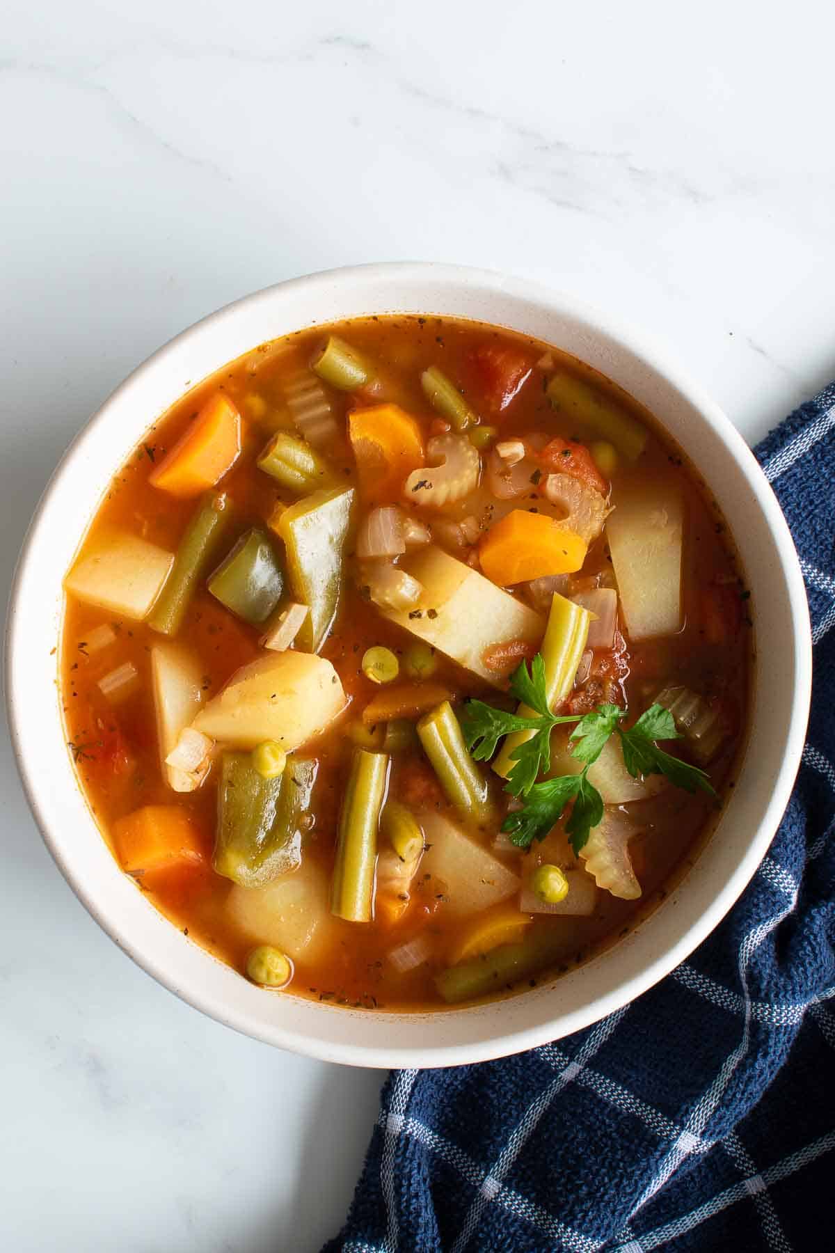 A bowl of pressure cooked vegetable soup.