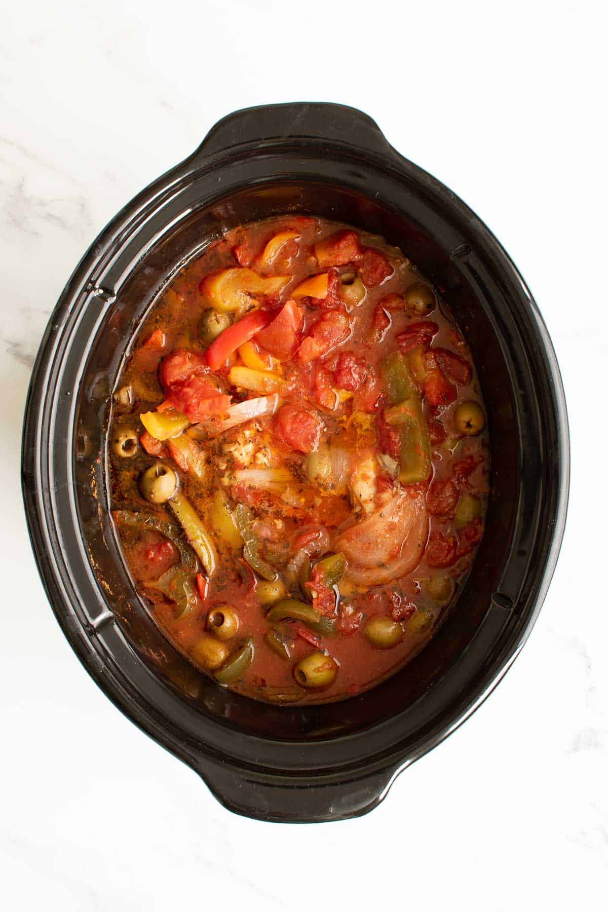 Spanish chicken stew in a slow cooker.