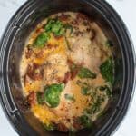Slow cooker tuscan chicken with spinach and tomatoes.