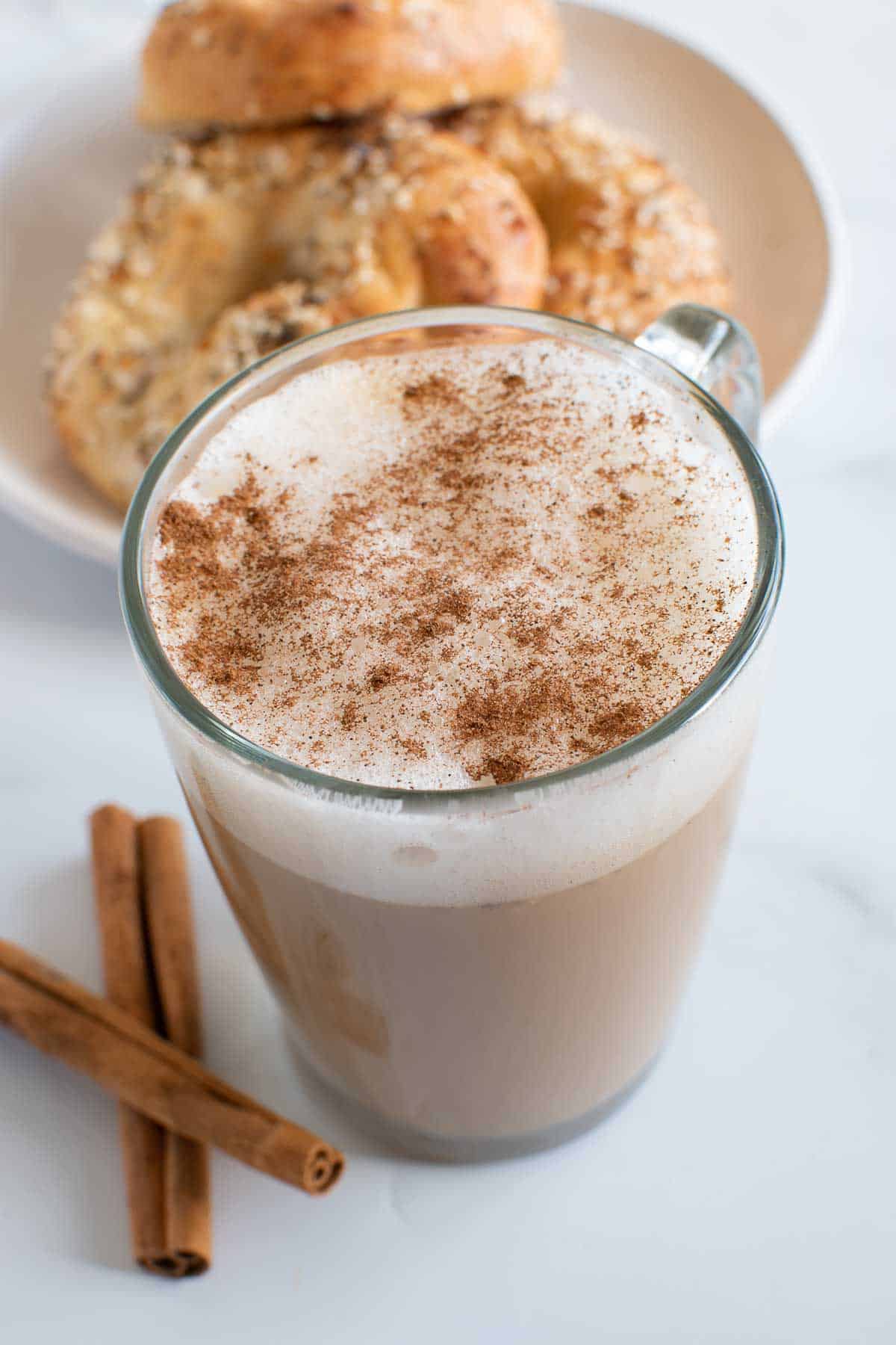 Eggnog coffee with cinnamon on top.