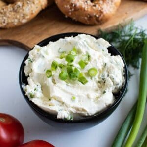 Scallion cream cheese in a bowl.