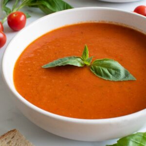 Spicy tomato soup with basil and red pepper flakes.