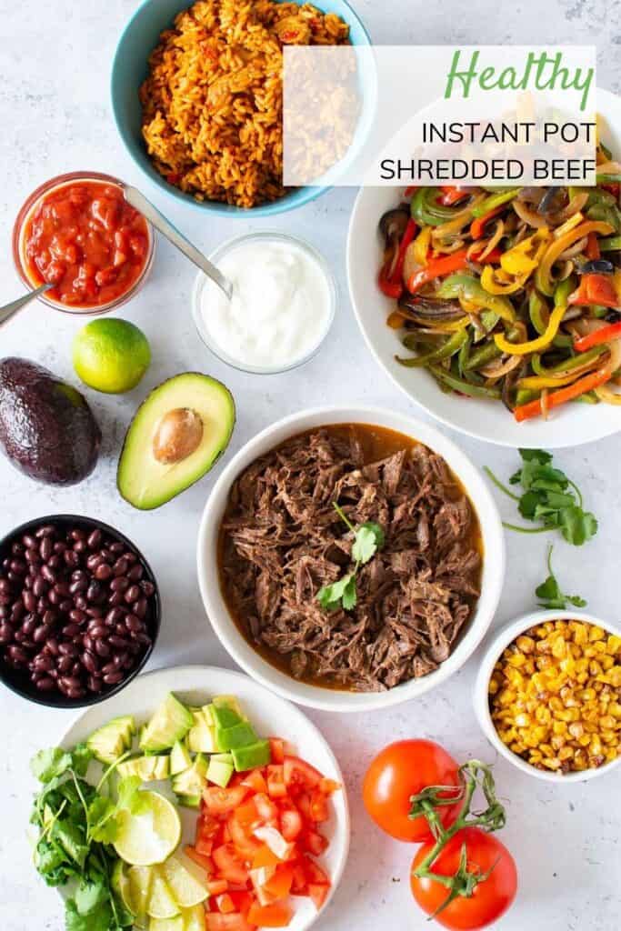 Pressure cooked shredded beef and tex mex side dishes.