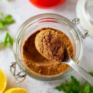 Shawarma spice mix in a spoon.