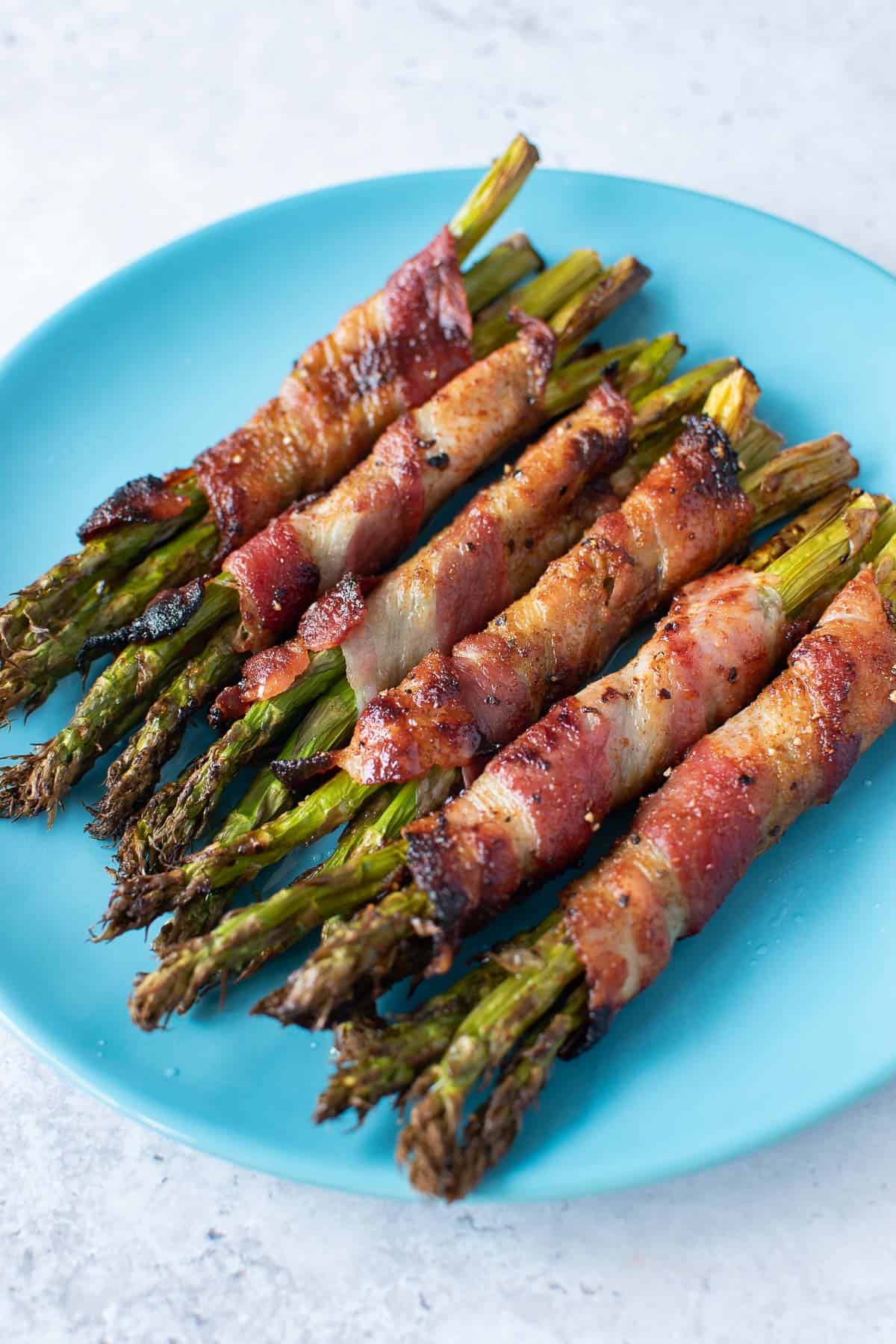 Air fryer asparagus wrapped in bacon.