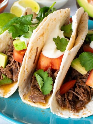 Close up of pulled beef tacos.