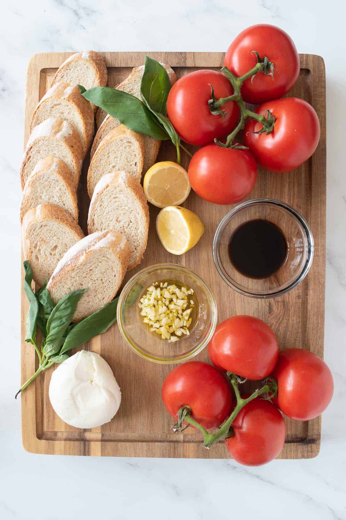 The prepared ingredients on a wooden cutting board.