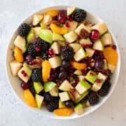 Close up of a fall fruit salad with blackberries and apples.
