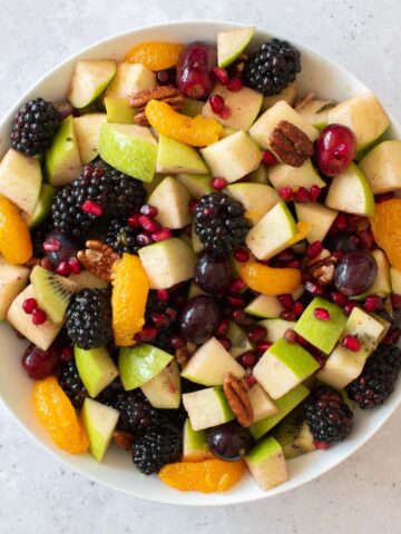 Close up of a fall fruit salad with blackberries and apples.