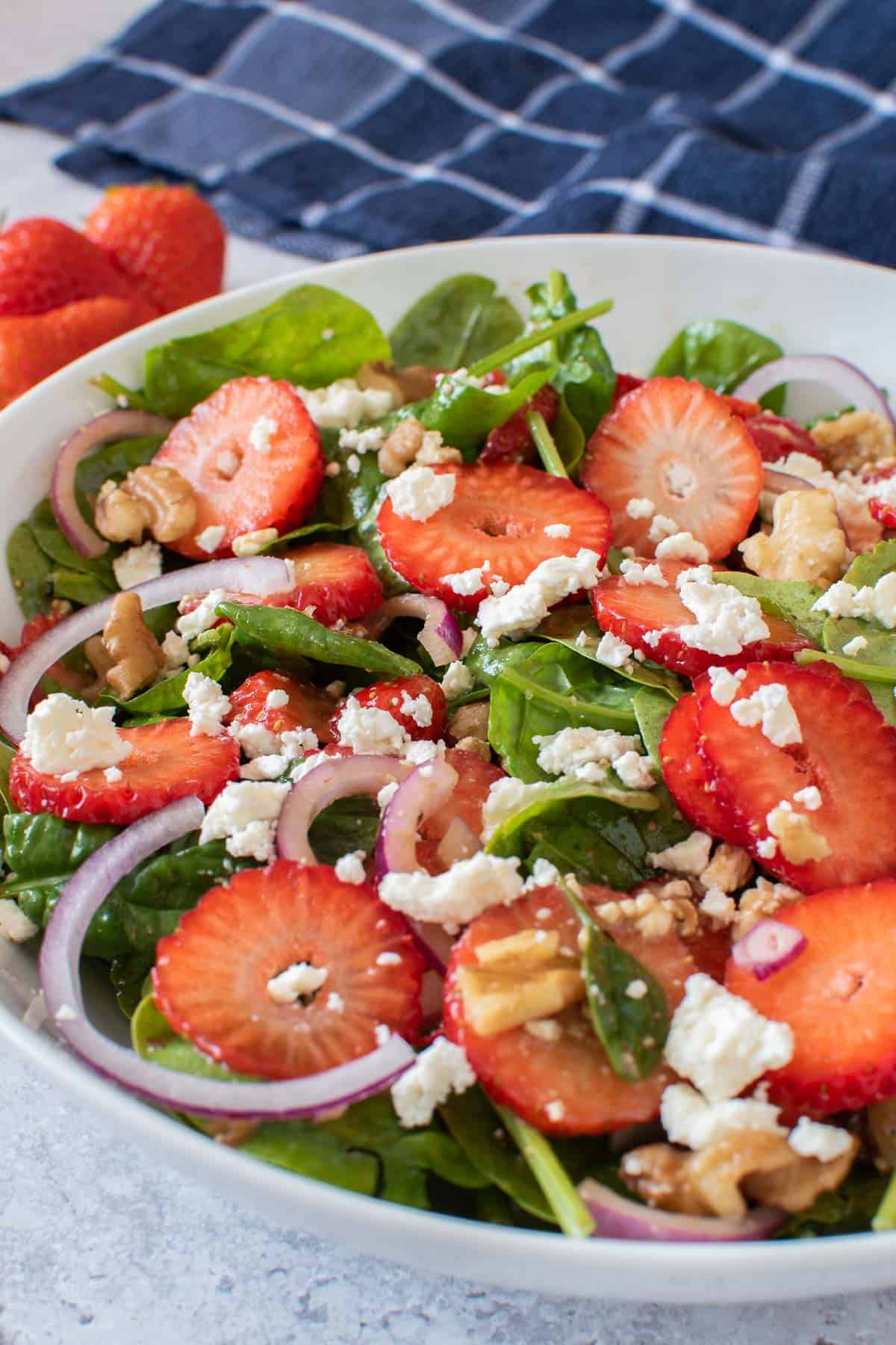 Close up of a strawberry summer salad.