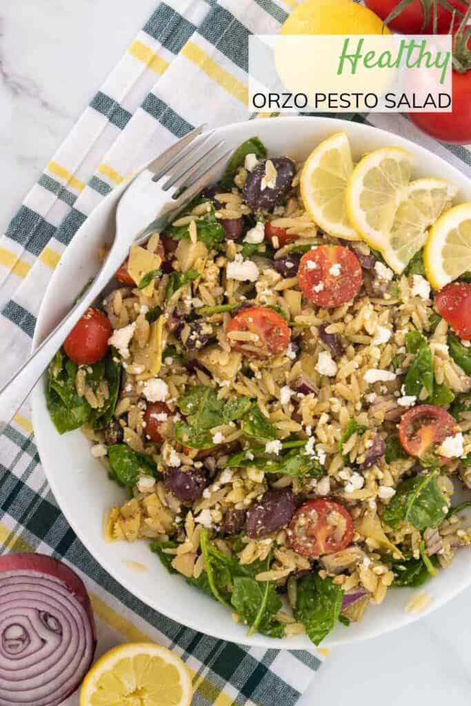 A bowl of salad, with the ingredients on the side.